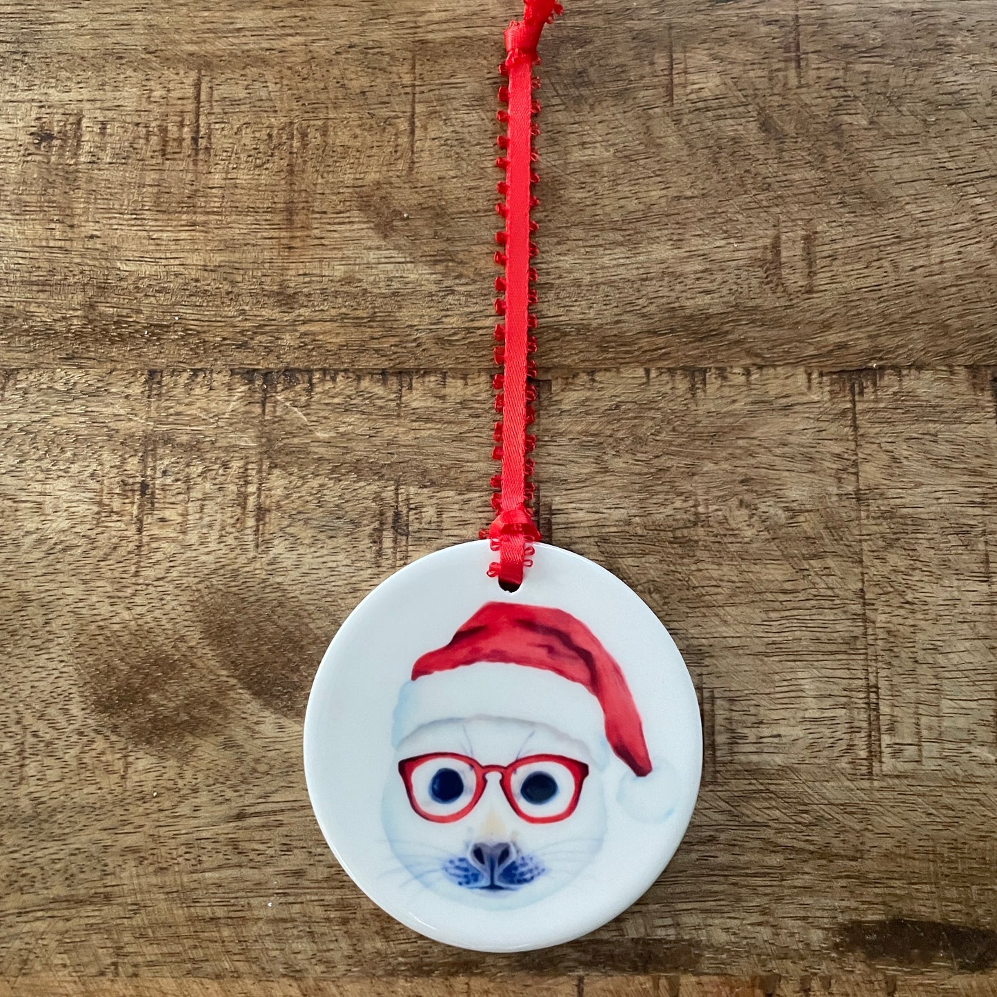 Holiday Seal in Glasses Ornament