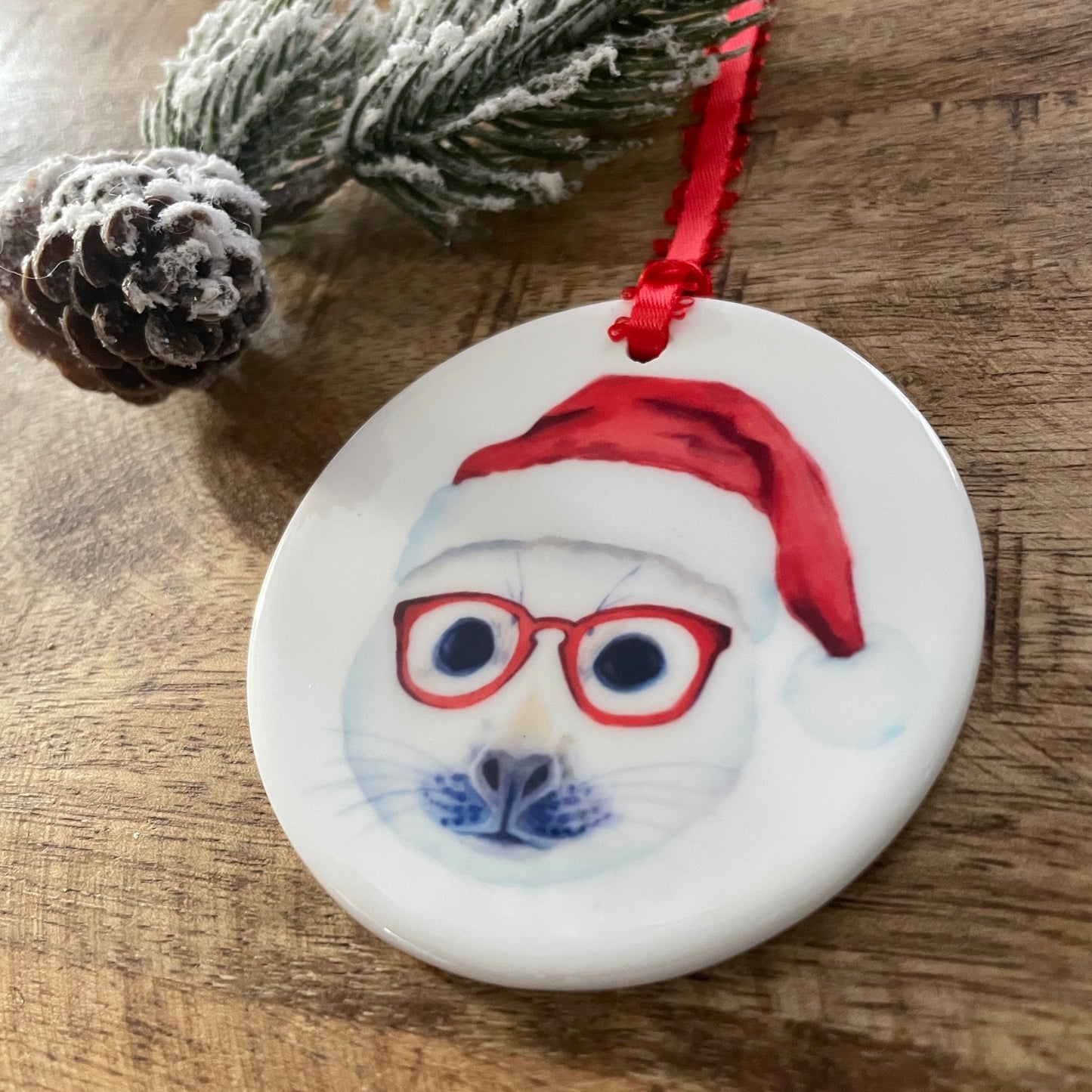Holiday Seal in Glasses Ornament